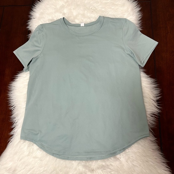 Lululemon Size 8 High-Neck Running and Training T-Shirt
Silver Blue Light Green - Picture 5 of 13